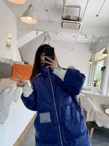 Длинный женский спортивный пуховик с полосками фото